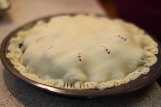 The pie is sealed and pricked